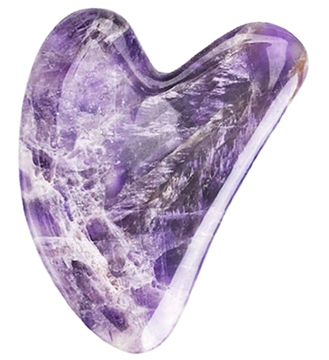 A gua sha facial massage can help relieve tension.