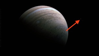 red arrow pointing to faint moons
