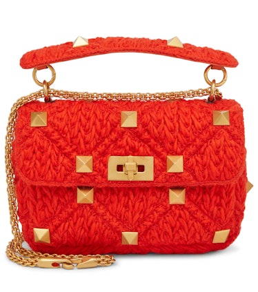 pring 2022 color trends red knitted bag with gold detailing 