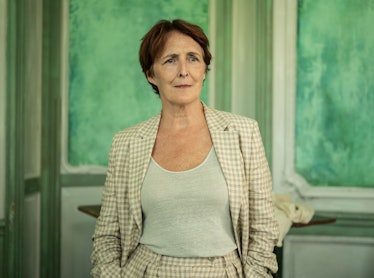 Fiona Shaw as Carolyn wearing a gingham suit in Killing Eve season 4 episode 4