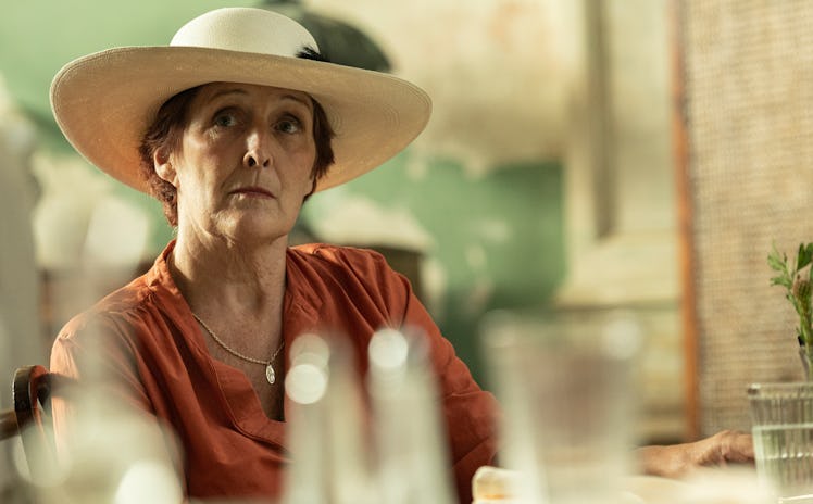 Fiona Shaw as Carolyn wearing a straw hat in Killing Eve season 4 episode 4