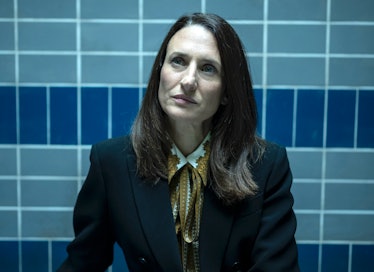 Camille Cottin as Hélène wearing a blazer and silky blouse in Killing Eve season 4 episode 4