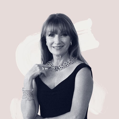 Jane Seymour in a black dress wearing a bracelet and necklace while posing