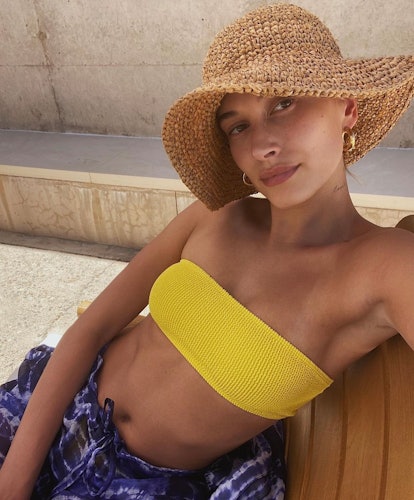 Hailey Bieber Wears Funky Yellow & Pink Checkered Hat At Beach