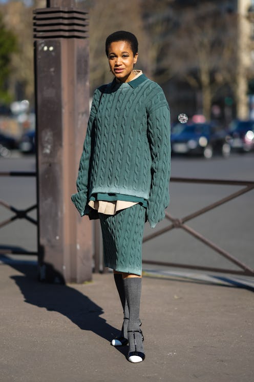 Tamu McPherson in socks and heels.