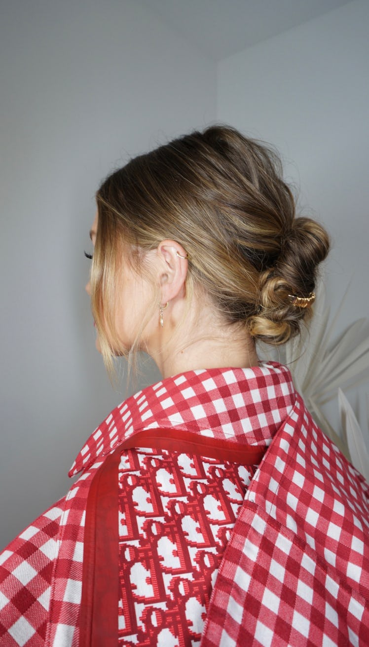 A detail shot of Olivia Holt's hairdo for the dior party