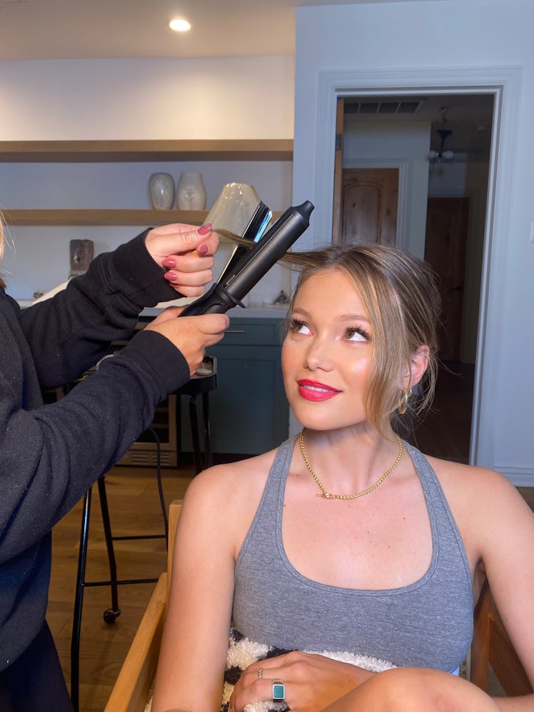 Olivia Holt getting her hair done