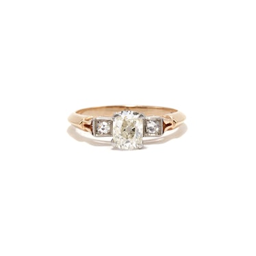 knife edge ring in 14k rose gold with an elongated Old Mine cut diamond set in four platinum prongs