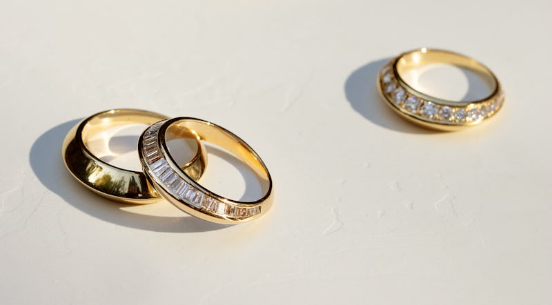 yellow gold and diamond knife-edge rings by Lizzie Mandler