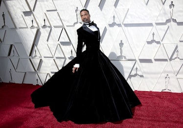 Billy Porter wearing a tuxedo-style gown to the 2019 Oscars