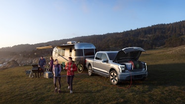 The Ford F-150 Lightning with "frunk" open.