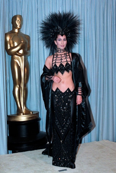 Cher wearing an out-there ensemble at the 1986 Oscars