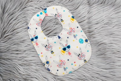 This baby bib with bunnies on it is a cute Easter basket filler.