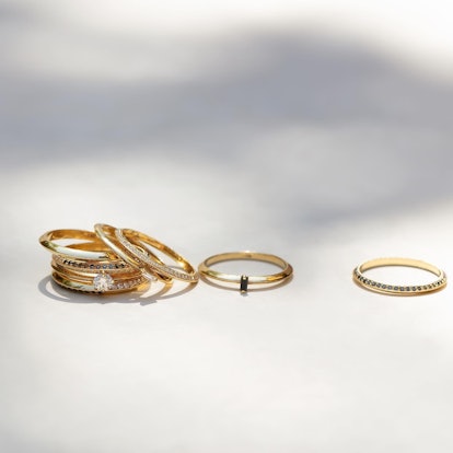 an assortment of knife-edge rings by Lizzie Mandler