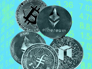 A Bitcoin, Ethereum, and other cryptocurrency coins on a blue-lime surface