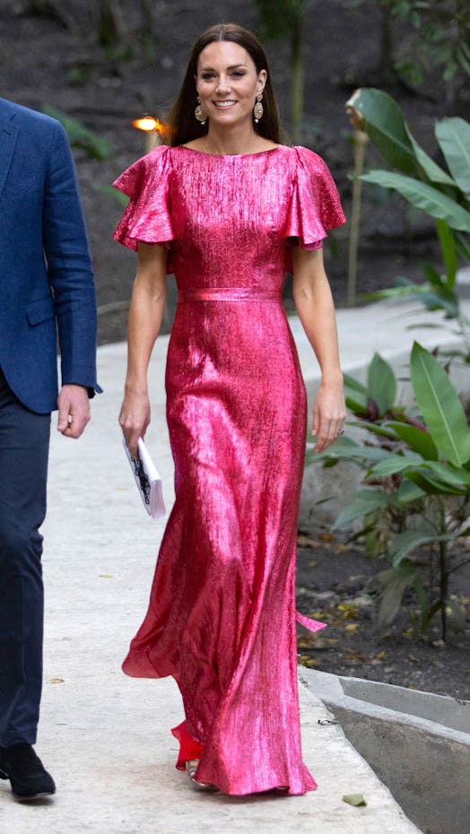 Kate Middleton wearing a sequined raspberry gown by the Vampire's Wife while touring Belize