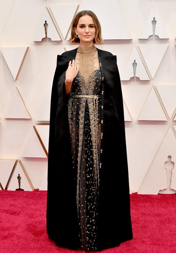 Natalie Portman wearing a Dior ensemble embroidered with the names of women snubbed for that year's ...