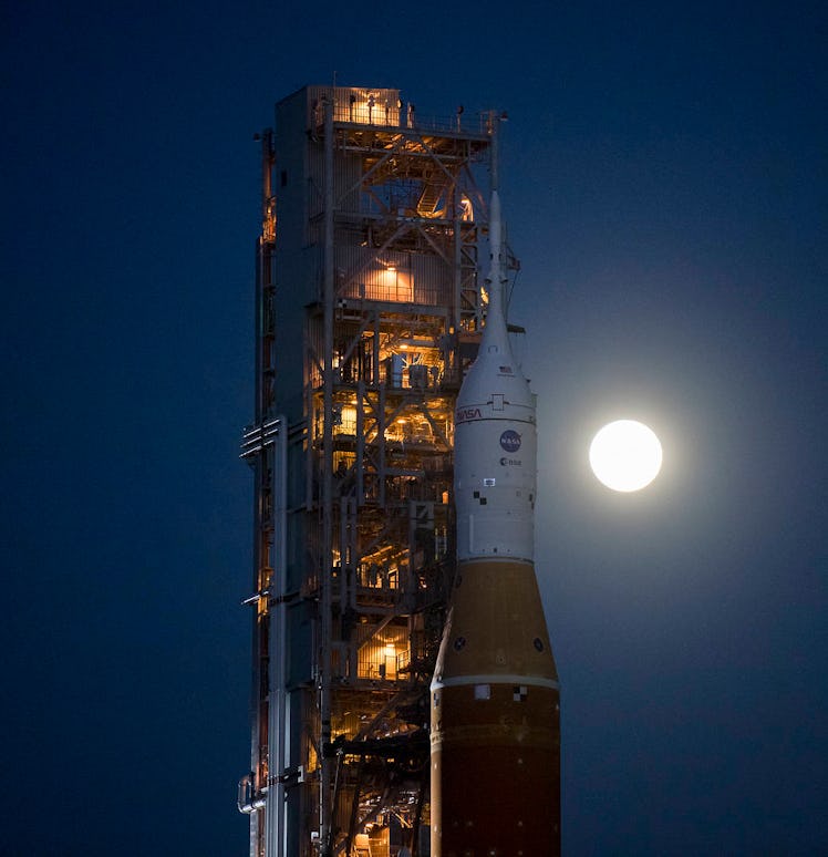 The artemis i rocket on a dark sky background