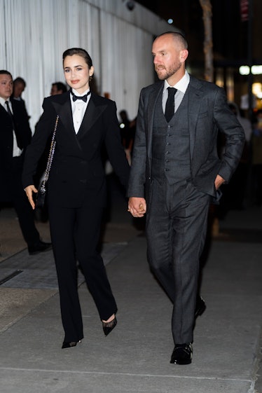 Lily Collins and Charlie McDowell wearing suits by Ralph Lauren