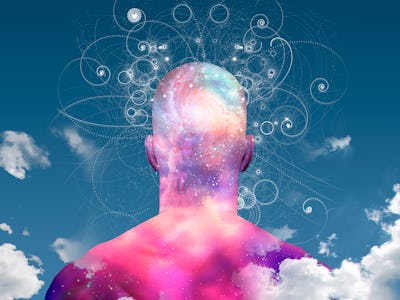 man with clouds and galaxy background