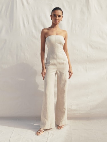 Non-traditional brides will love this strapless linen jumpsuit from Reformation.
