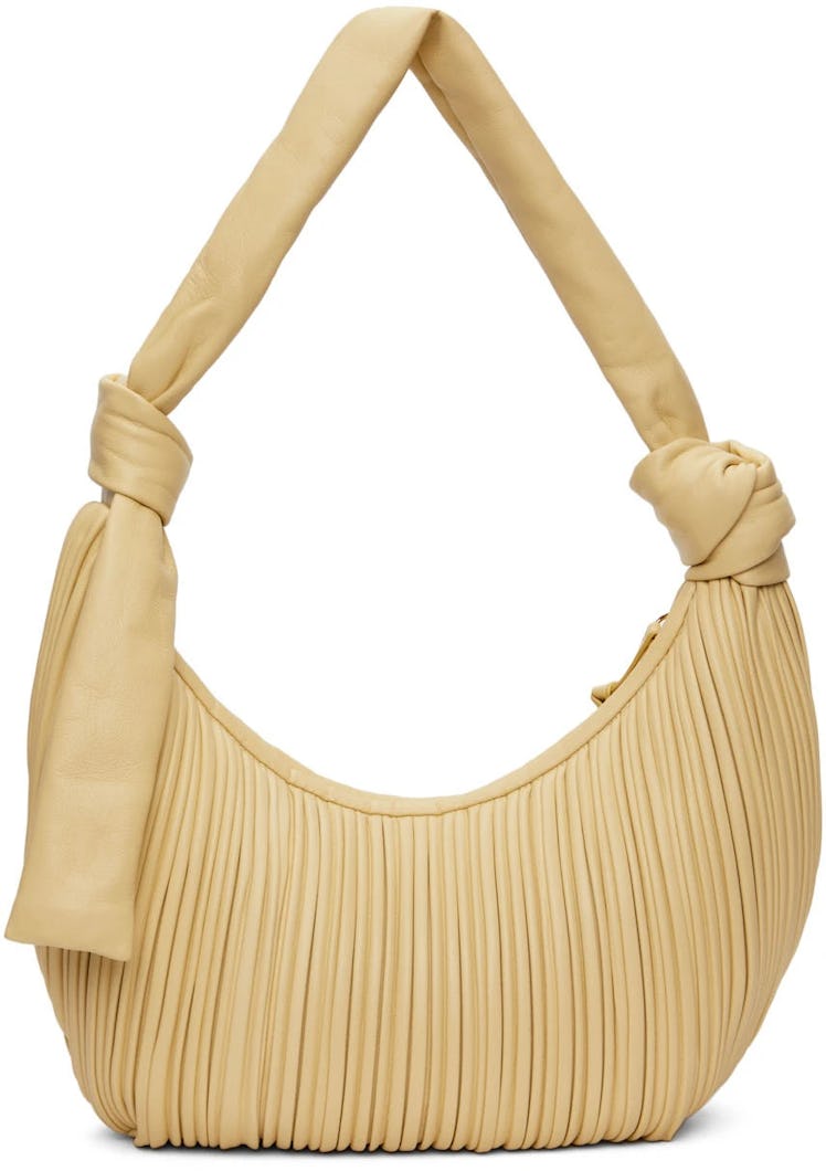 2022 handbag trends unexpected textures yellow pleated leather bag