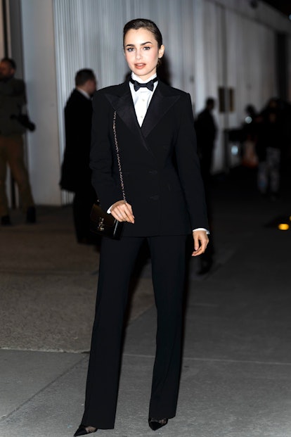 Lily Collins wearing a black tuxedo by Ralph Lauren