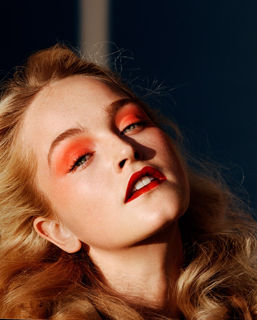 Jean Campbell with smoky red eye makeup and bright red lipstick