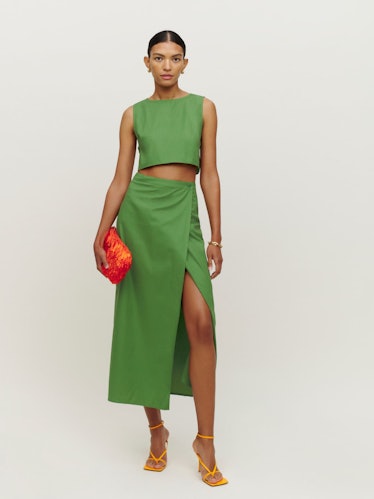 This green two-piece set from Reformation's bridal range is a great wedding guest outfit.