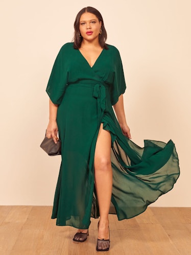 This emerald green maxi dress from Reformation is a perfect wedding guest piece.