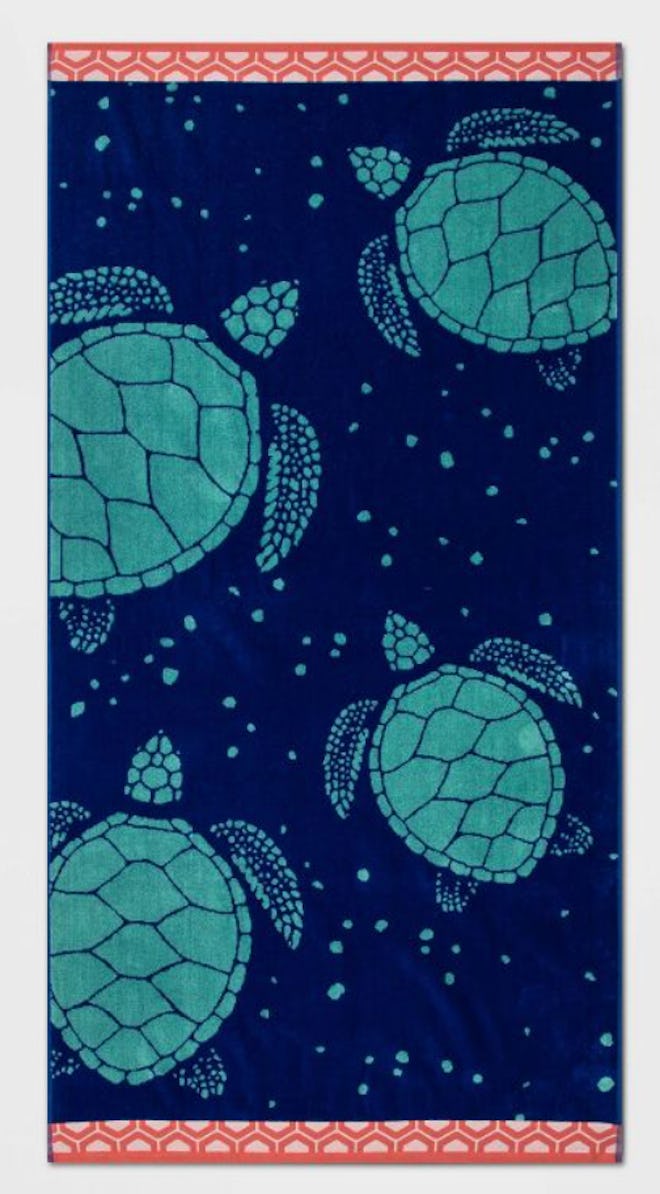 This oversized beach towel for kids can be rolled up and added to your kid's Easter basket.