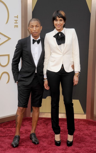 Pharrell Williams and Helen Lasichanh on the red carpet at the 2014 Oscars