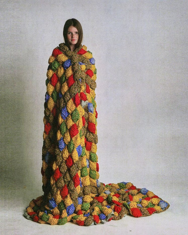 A model wearing a quilt by ERL