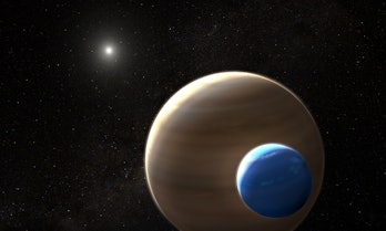 gas giant with a smaller planet behind it