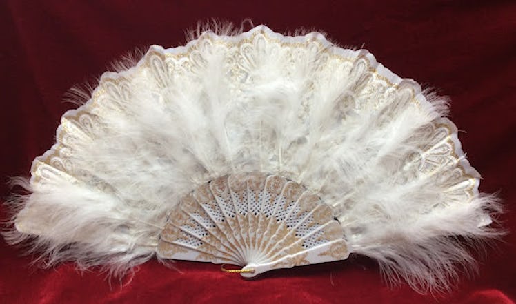 This hand fan is an example of Bridgerton home decor.