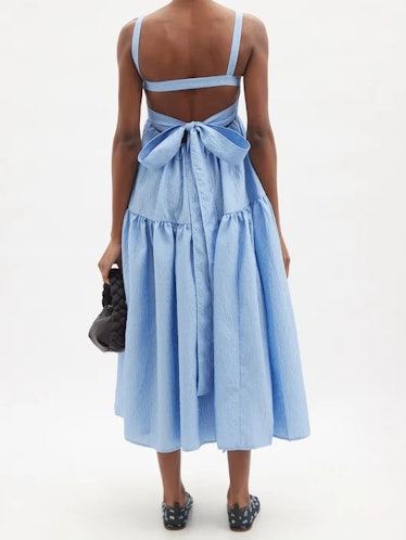 sexy wedding guest dresses maximalist silhouettes Cecilie Bahnsen open back blue tiered midi 