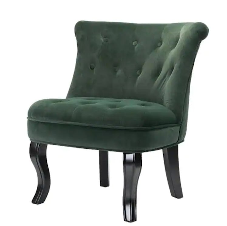 This tufted accent chair is an example of Bridgerton home decor.
