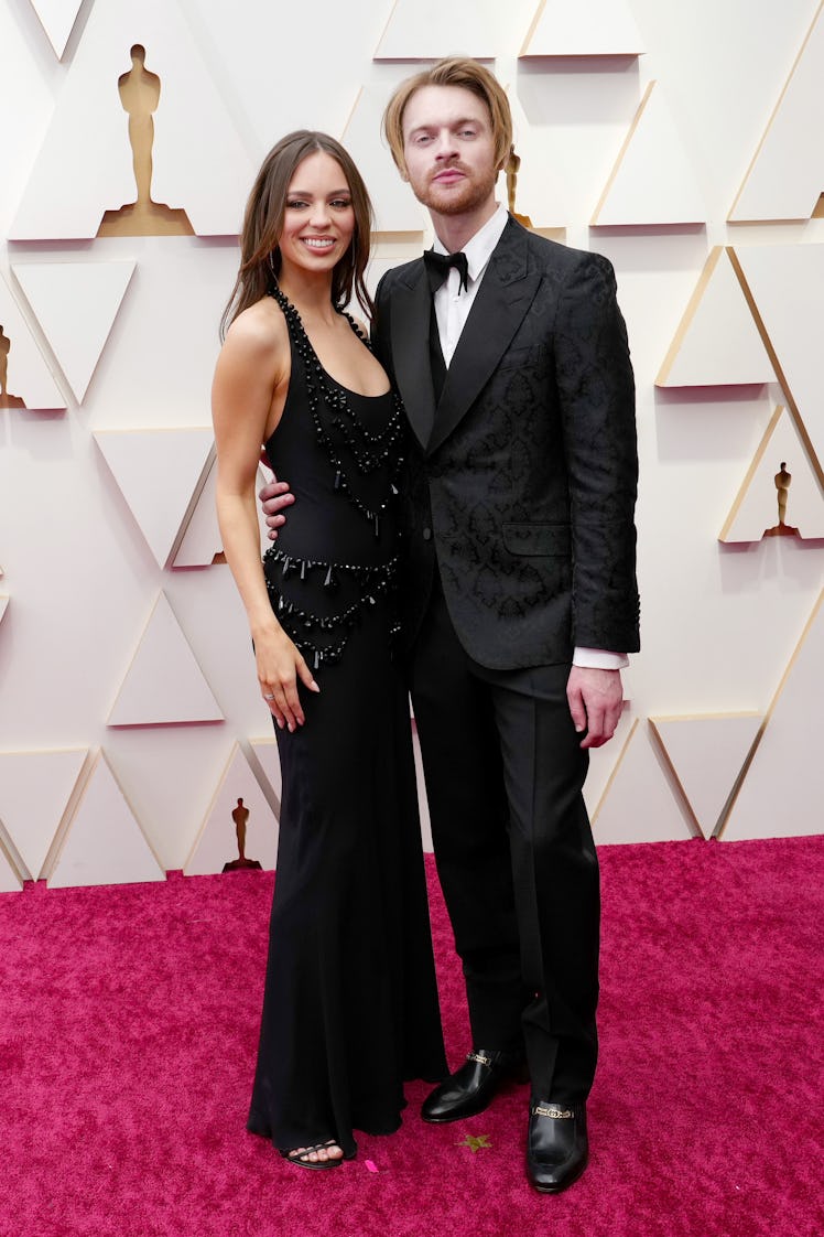 Claudia Sulewski and FINNEAS attend the 94th Annual Academy Awards