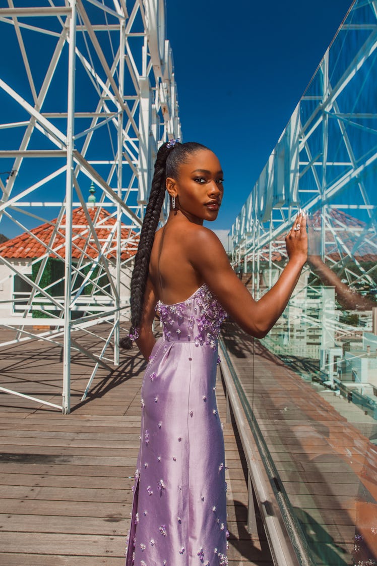 Demi Singleton in a lavender off-the-shoulder satin dress with crystal beads at the Oscars 2022