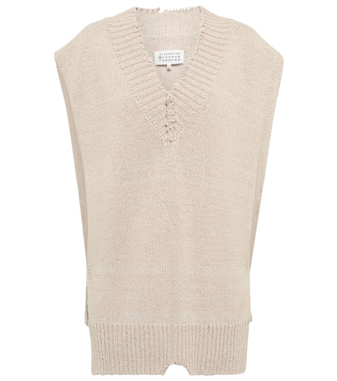 Maison Margiela distressed knit vest to wear in April outfit
