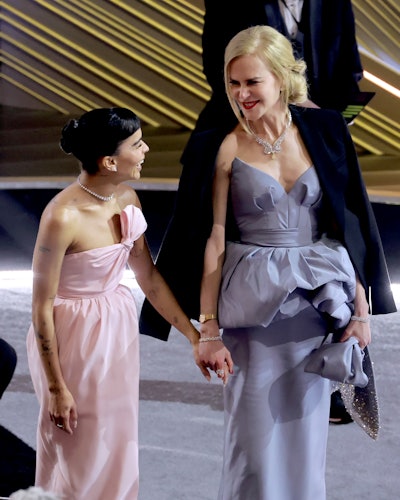 Zoe Kravitz and Nicole Kidman hold hands at the 2022 Oscars