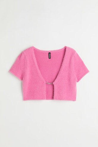 This pink cropped cardigan from H&M will help you master the sexy dressing trend.