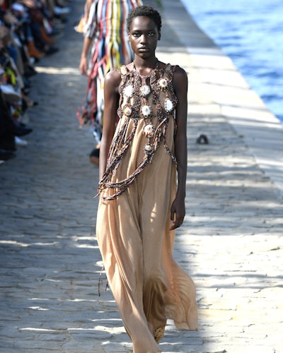 a model wearing a maxi dress on the Chloé Spring/Summer 2022 runway