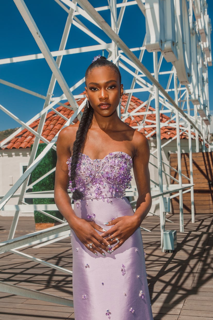 Demi Singleton in a lavender off-the-shoulder satin dress with crystal beads at the Oscars 2022