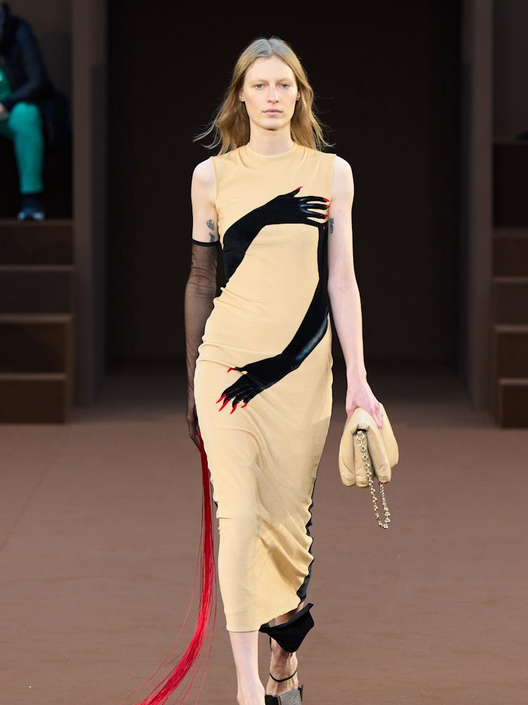 A dress with hands printed on it from Loewe