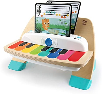 Between the rainbow keys and tiny sheet music, this is easily the cutest piano you'll ever see.