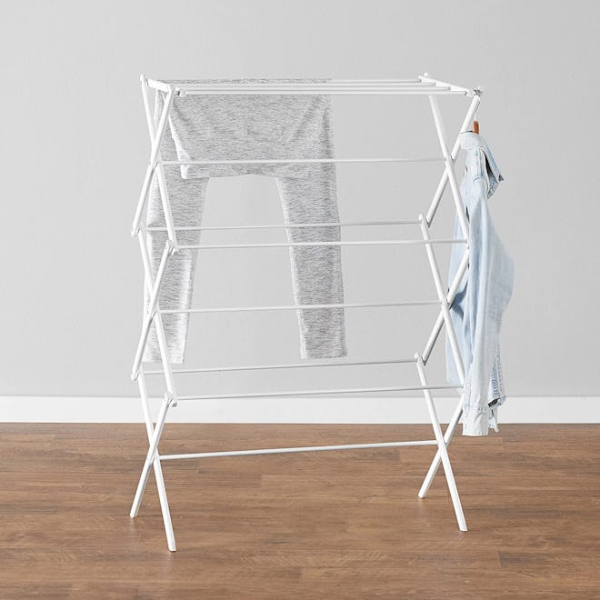 everyday problem solving task Amazon Basics Folding Laundry Rack