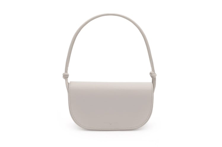 This off-white baguette bag from von Holzhausen is minimalist and sustainably made.