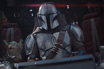 Mando and Grogu in their spaceship in The Mandalorian Season 3