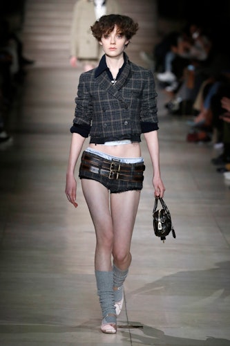 A model walks the runway during the Miu Miu Womenswear Fall/Winter 2022-2023 show as part of Paris F...
